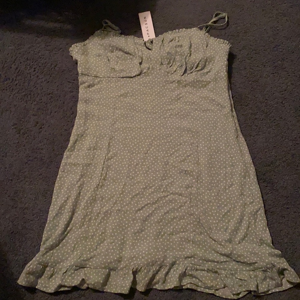 green dress with white flowers.